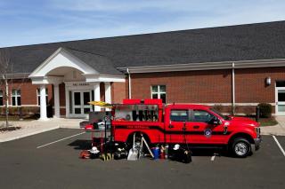 front of fire marshal building and truck